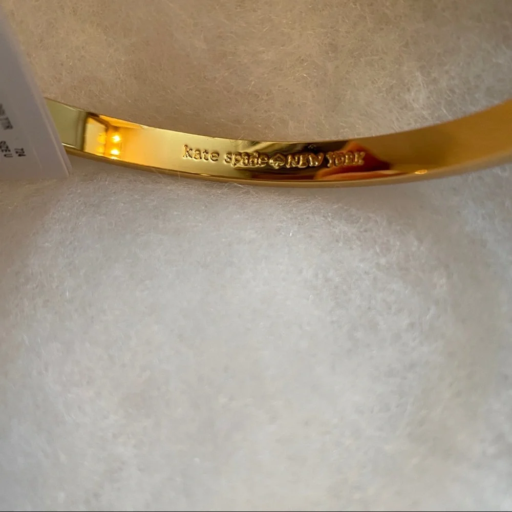 KATE SPADE NEW NWT BRACELET BANGLE GOLD PLATE GLITTER BOW MOON RIVER JEWELRY - Picture 7 of 7